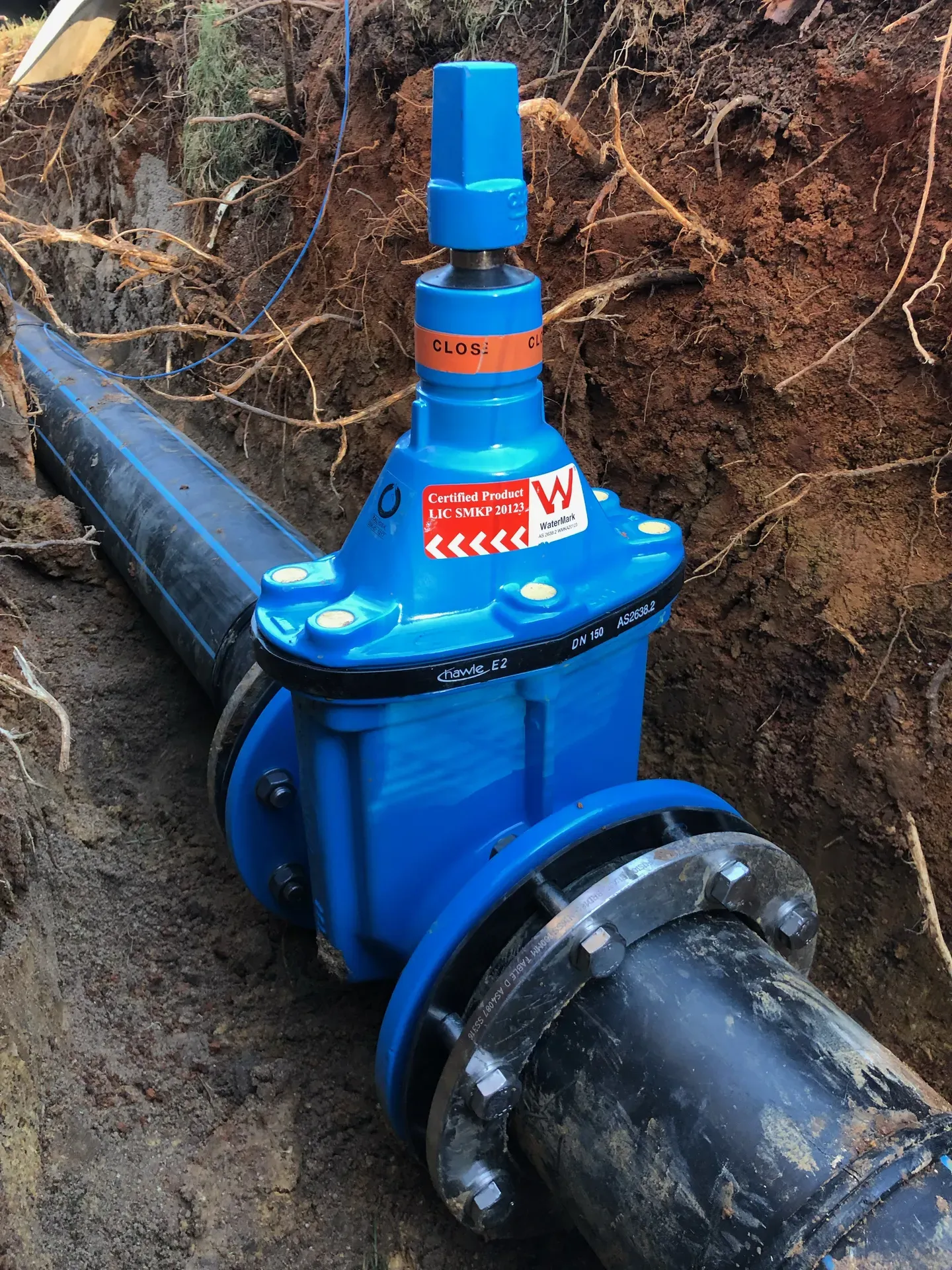 Blue valve on an HDPE poly-welded pipe
